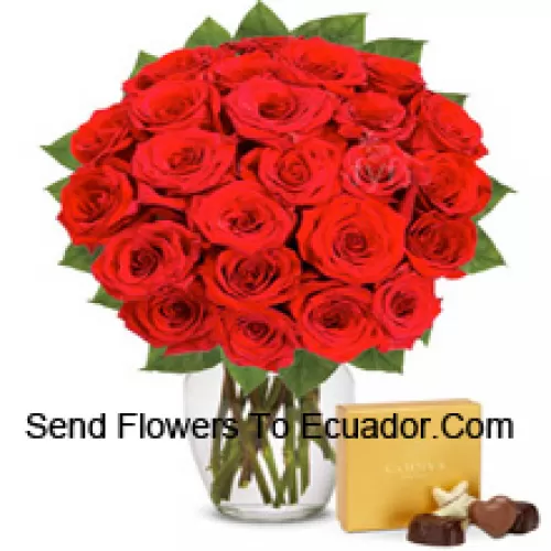 31 Red Roses With Some Ferns In A Glass Vase Accompanied With An Imported Box Of Chocolates