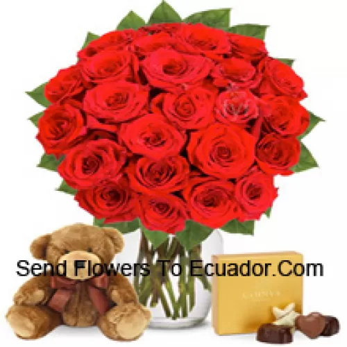 31 Red Roses With Some Ferns In A Glass Vase Accompanied With An Imported Box Of Chocolates And A Cute 12 Inches Tall Brown Teddy Bear